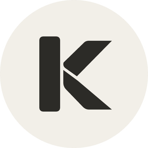 The Kami logo, a dark K on a round paper-colored badge